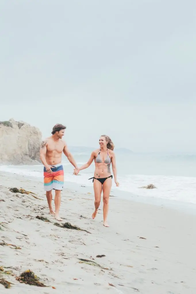 walking, beach, couple, resort, vacation, holding hands, paradise, nature, leisure